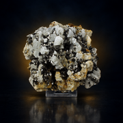 Natural Fluorescent Transparent Apatite Crystal with Pyrite Black Inclusions