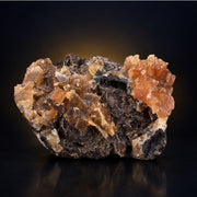 Tabular Red Calcite on Dark Rocky Matrix · 250 g · 9 × 7 × 4 cm