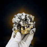 Natural Fluorescent Transparent Apatite Crystal with Pyrite Black Inclusions