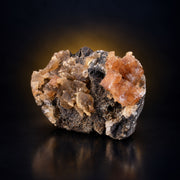 Tabular Red Calcite on Dark Rocky Matrix · 250 g · 9 × 7 × 4 cm