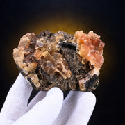 Tabular Red Calcite on Dark Rocky Matrix · 250 g · 9 × 7 × 4 cm